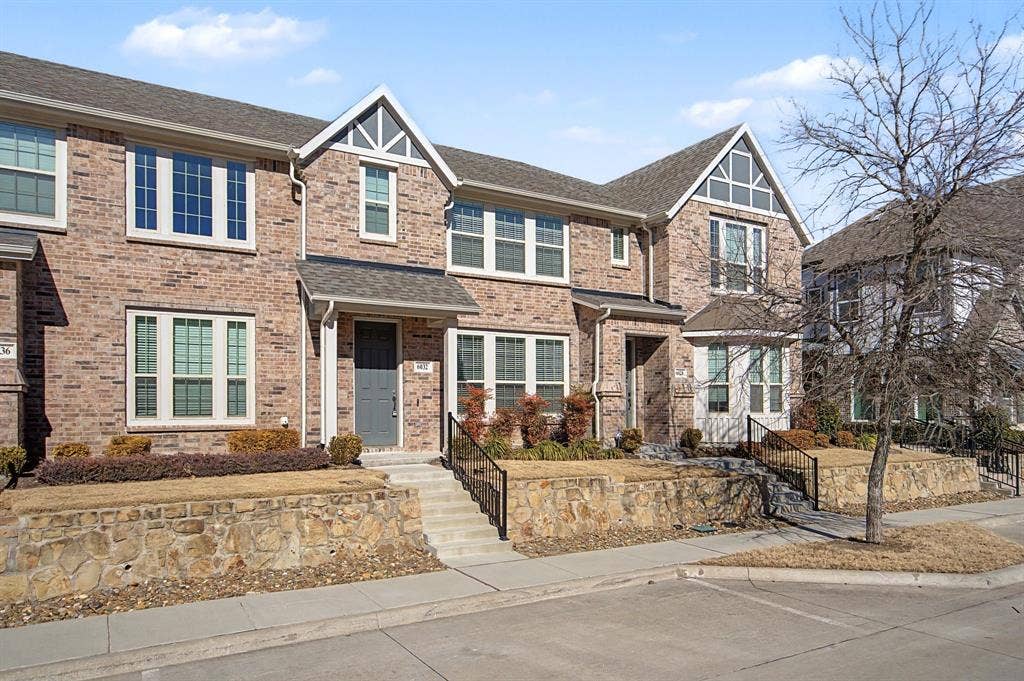 6032 Silverado Trail, McKinney, TX 75070 Brick exterior townhome with contrasting gables and white trim