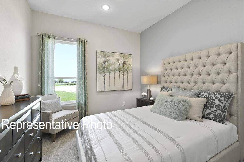 4384 Laurel Trail, Midlothian, TX 76065 Carpeted bedroom featuring a large window, recessed lighting, and light-toned wall finishes
