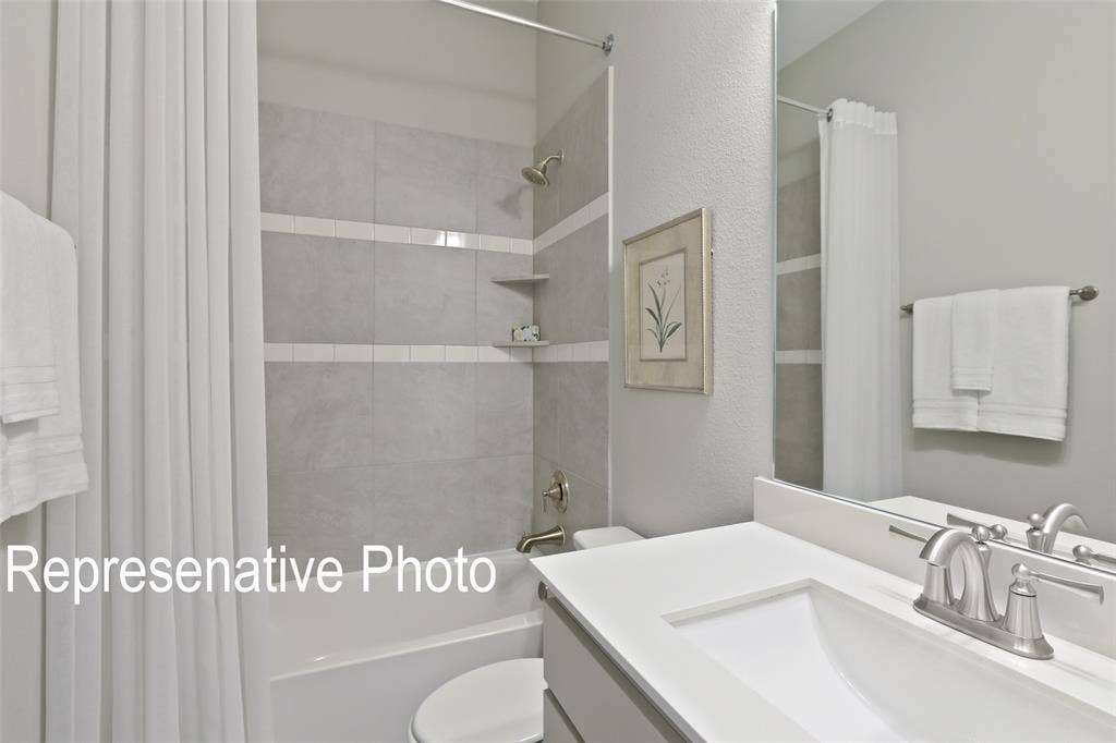 4384 Laurel Trail, Midlothian, TX 76065 Bathroom featuring a single-sink vanity with white countertop, chrome faucet, and integrated sink basin