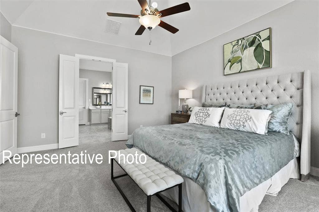 4384 Laurel Trail, Midlothian, TX 76065 Carpeted room with vaulted ceiling and a ceiling fan