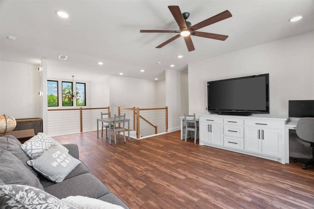 3621 Fritz Lane, Corinth, TX 76208 Open concept living area featuring wood-finish flooring, recessed lighting, and a modern ceiling fan