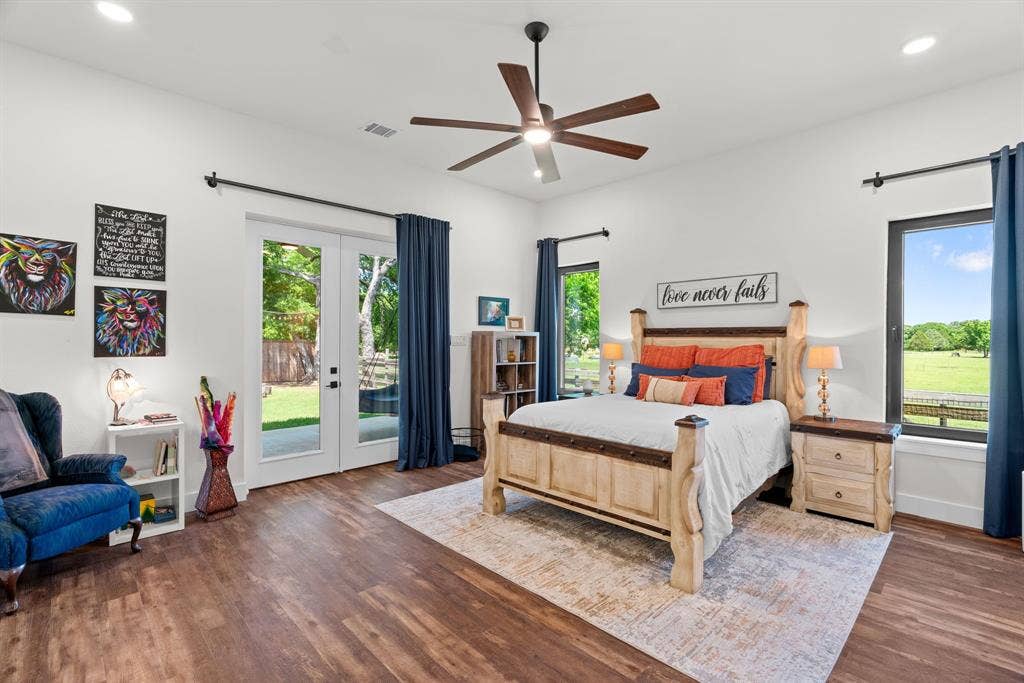3621 Fritz Lane, Corinth, TX 76208 Spacious room featuring wood-finish flooring and bright white walls