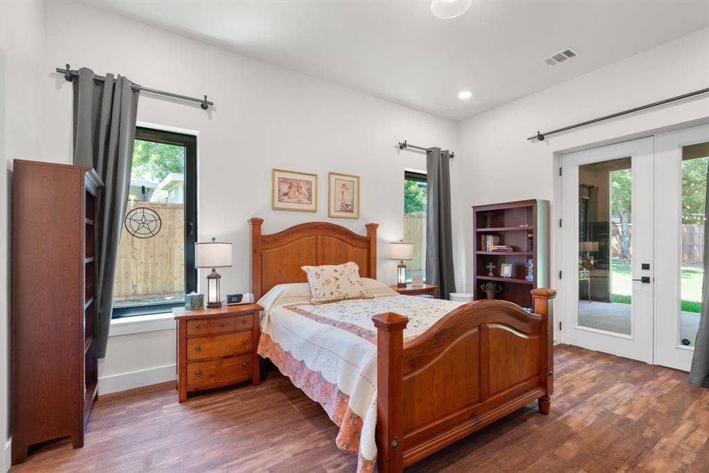 3621 Fritz Lane, Corinth, TX 76208 Wood-finish flooring with white walls and recessed lighting