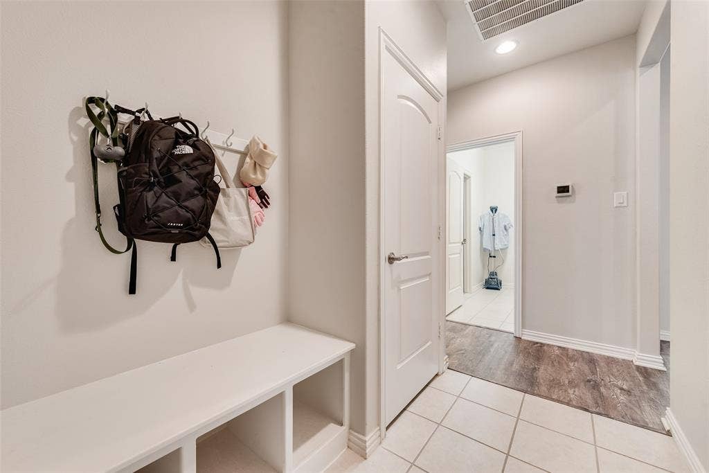 1432 Westview Lane, Northlake, TX 76226 Mud room off of garage for easy organization at 1432 Westview Ln in the Canyon Falls community in Northlake, TX