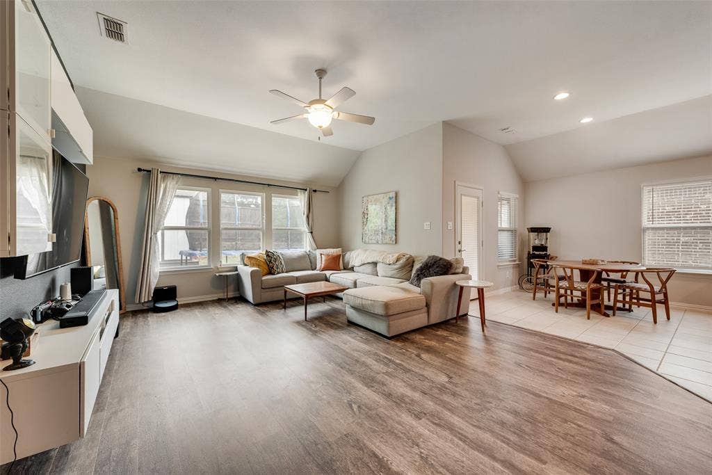 1432 Westview Lane, Northlake, TX 76226 Open floor plan showing view into dining area from living room at 1432 Westview Ln in the Canyon Falls community in Northlake, TX
