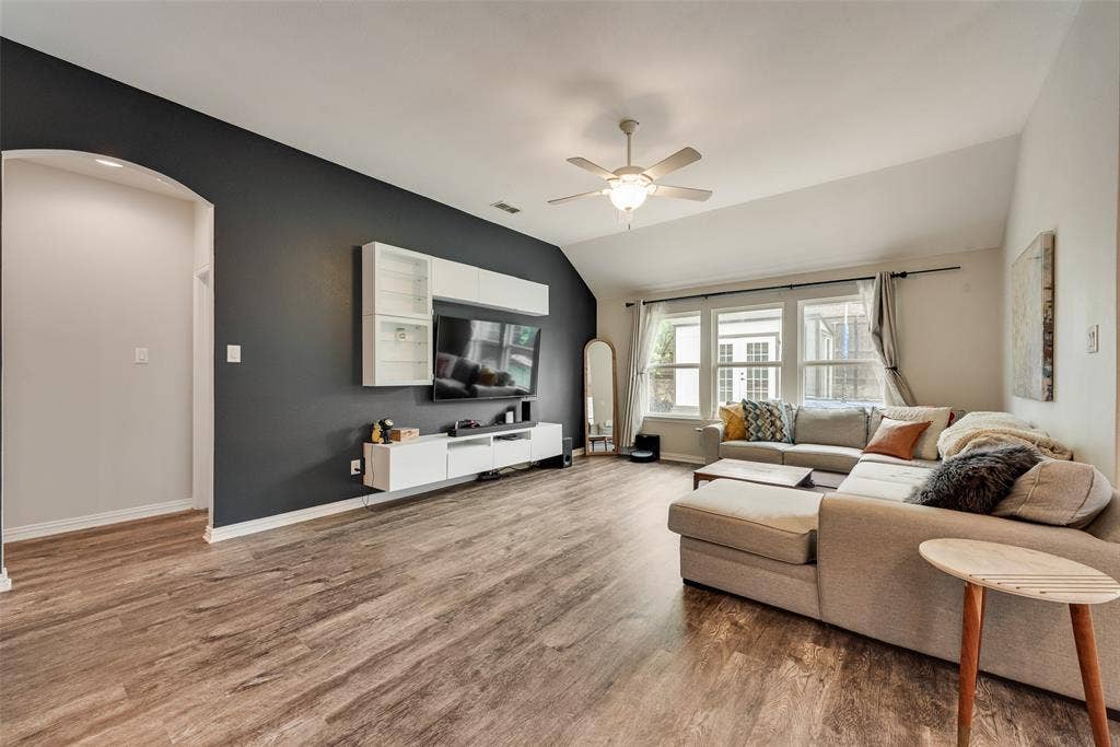 1432 Westview Lane, Northlake, TX 76226 Spacious living room with new LVP flooring and natural light from the large windows at 1432 Westview Ln in the Canyon Falls community in Northlake, TX