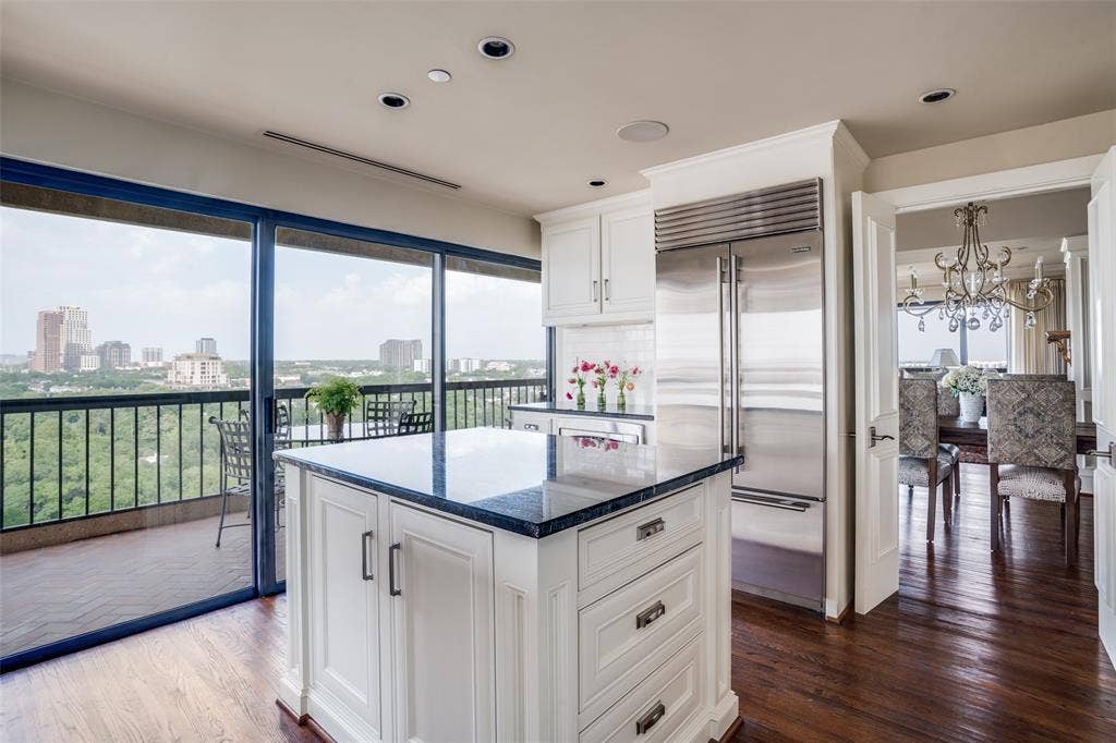 3831 Turtle Creek Boulevard, #15E, Dallas, TX 75219 Kitchen opens to terrace.