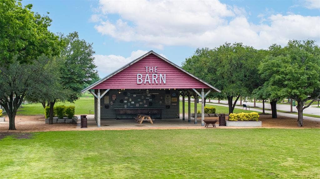 1408 9th Street, Argyle, TX 76226 The home is ideally located just down the street from the iconic Red Barn, the heart of the community where neighborhood activities and events are hosted year-round.