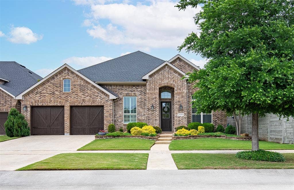 1408 9th Street, Argyle, TX 76226 This home’s stunning curb appeal is impossible to resist—you’ll be eager to step inside!