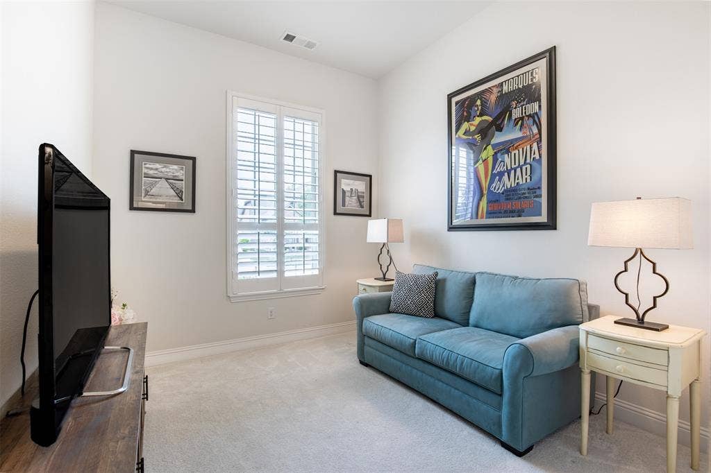 1408 9th Street, Argyle, TX 76226 One of the secondary bedrooms is thoughtfully split from the other secondary rooms, making it an ideal private space for guests.