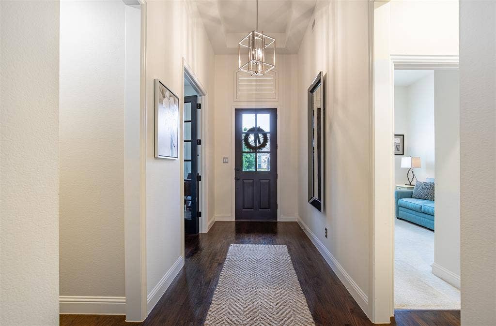 1408 9th Street, Argyle, TX 76226 As you step inside, you’re immediately greeted by beautiful hardwood floors that set the tone for the rest of the home.