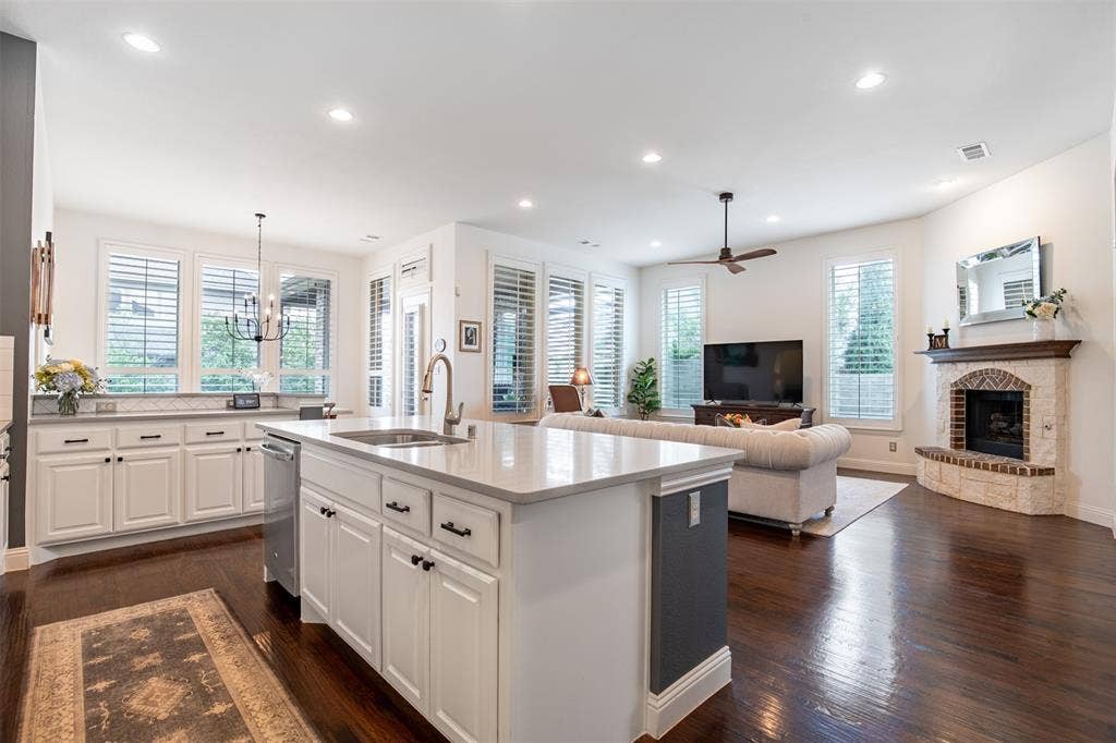 1408 9th Street, Argyle, TX 76226 The kitchen flows seamlessly into the living room, creating an open and connected space that’s perfect for both everyday living and entertaining.
