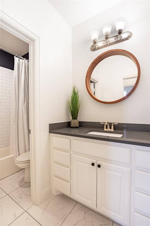 1408 9th Street, Argyle, TX 76226 A full guest bathroom is conveniently located just across from the secondary bedroom, offering easy access and comfort for visitors.