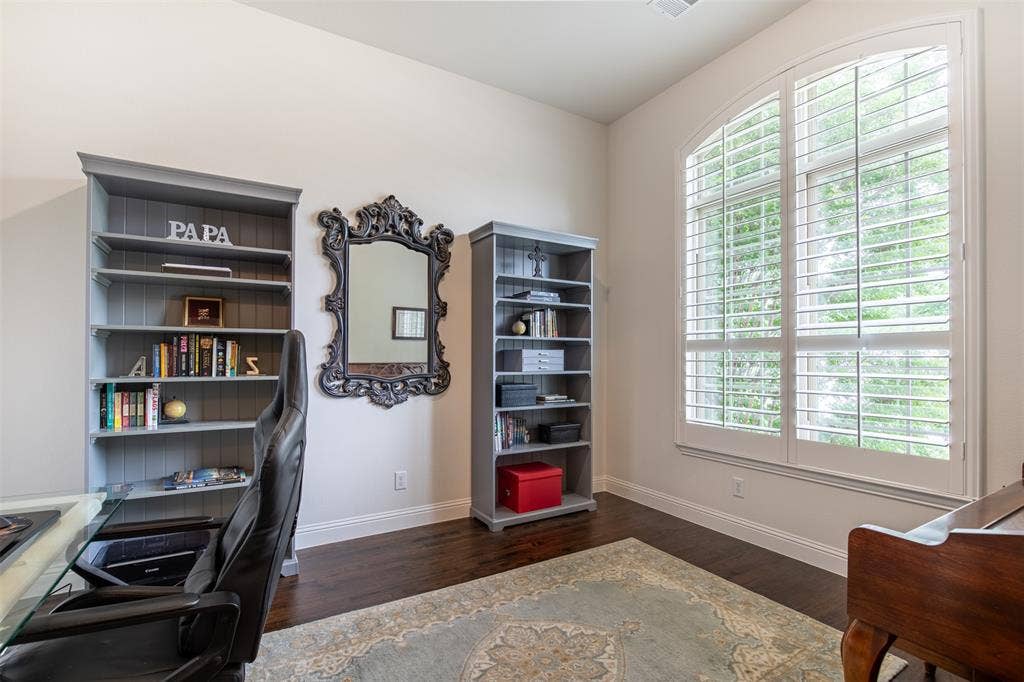 1408 9th Street, Argyle, TX 76226 A designated office space filled with an abundance of natural light creates the perfect setting for productivity and focus.