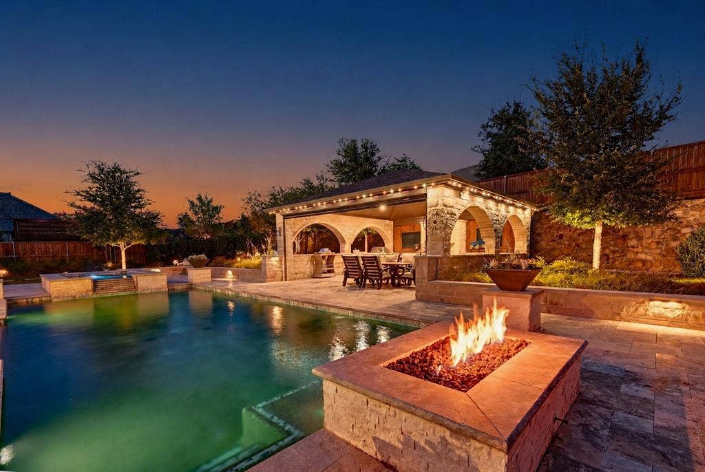 7108 Eagles Ridge Court, Argyle, TX 76226 This like-new, energy-efficient Drees Custom Home sits on nearly half an acre in a quiet cul-de-sac and features a backyard retreat with over $450K in upgrades.