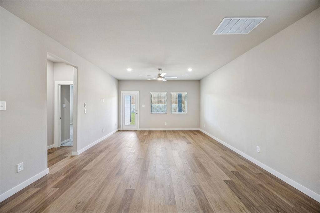 Living and Dining Room in the Willow home plan by Trophy Signature Homes – REPRESENTATIVE PHOTO