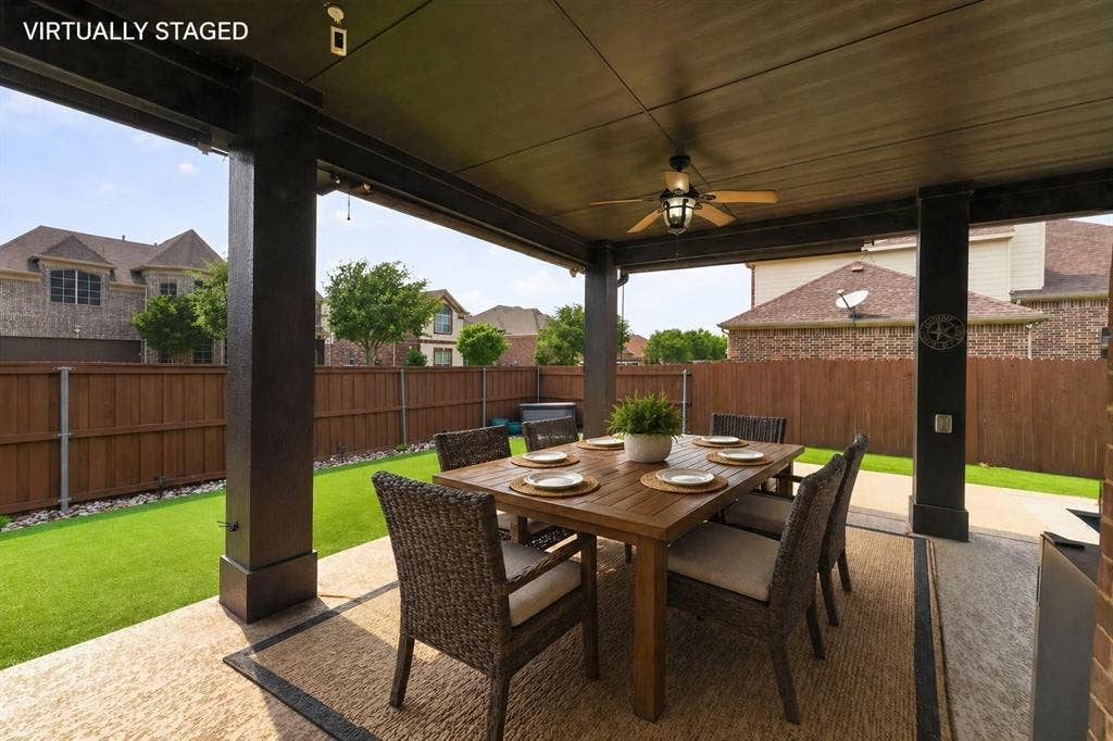 2760 Explorador, Grand Prairie, TX 75054 Covered patio featuring a ceiling fan and a concrete slab.