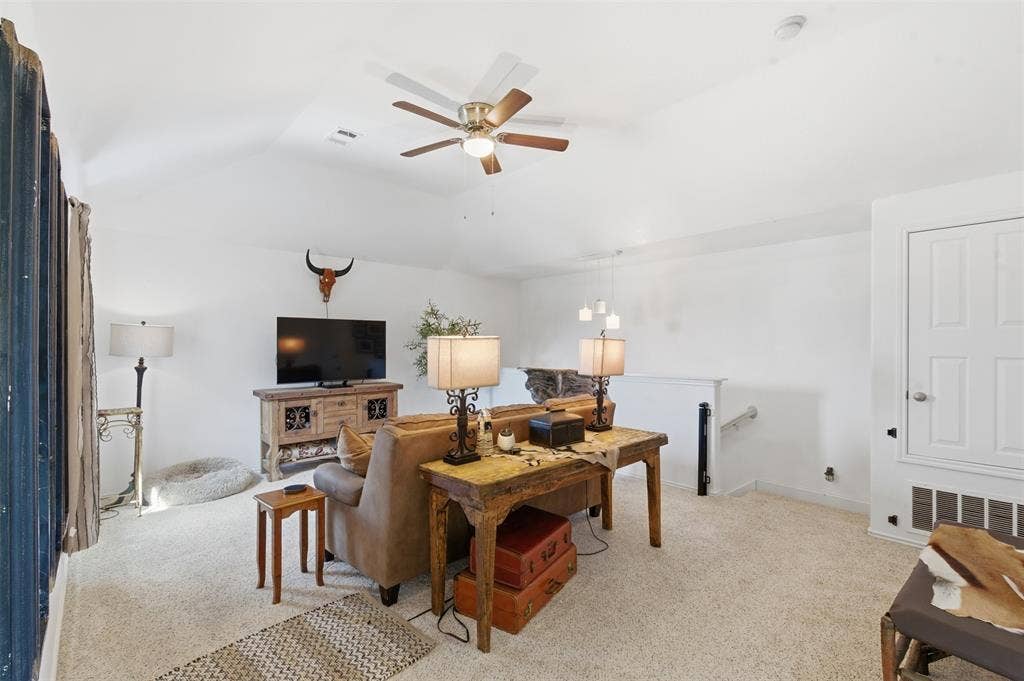 1081 Barrington Drive, Prosper, TX 75078 Spacious room with vaulted ceilings and light-toned carpeting