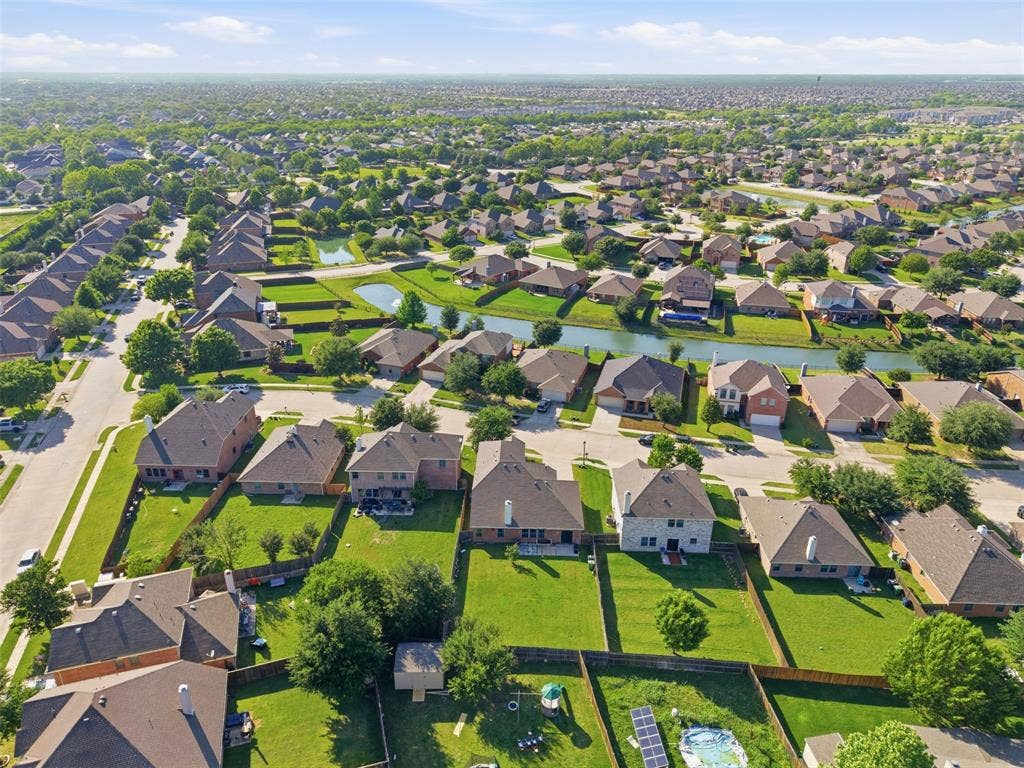 1081 Barrington Drive, Prosper, TX 75078 Expansive aerial view showcasing a neighborhood with numerous residential properties