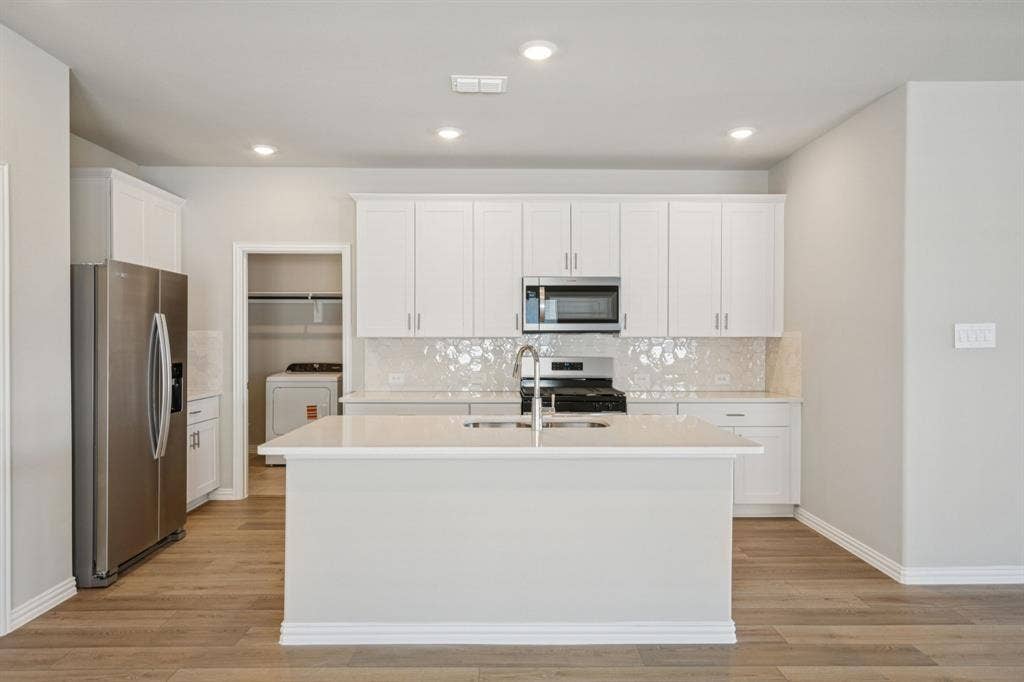 3518 Bridgeport Drive, Farmersville, TX 75442 Photo is not of the actual home, but is an inspirational photo of builder’s model home and may depict options, furnishings, and/or decorator features that are not included.