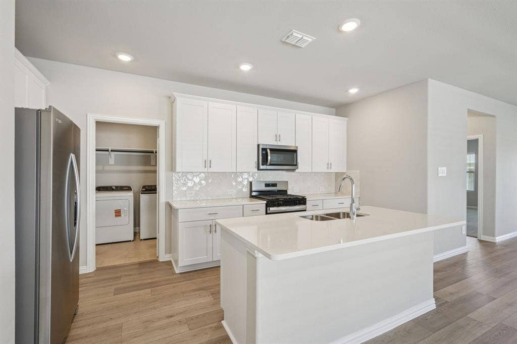 3518 Bridgeport Drive, Farmersville, TX 75442 Photo is not of the actual home, but is an inspirational photo of builder’s model home and may depict options, furnishings, and/or decorator features that are not included.