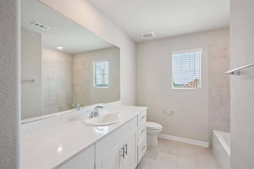 3518 Bridgeport Drive, Farmersville, TX 75442 Photo is not of the actual home, but is an inspirational photo of builder’s model home and may depict options, furnishings, and/or decorator features that are not included.