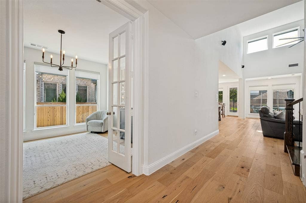 961 Gladewater Drive, Prosper, TX 75078 This flex space is enclosed behind glass French doors and is perfect for a quiet study, work from home office, playroom or gym space away from the main living area