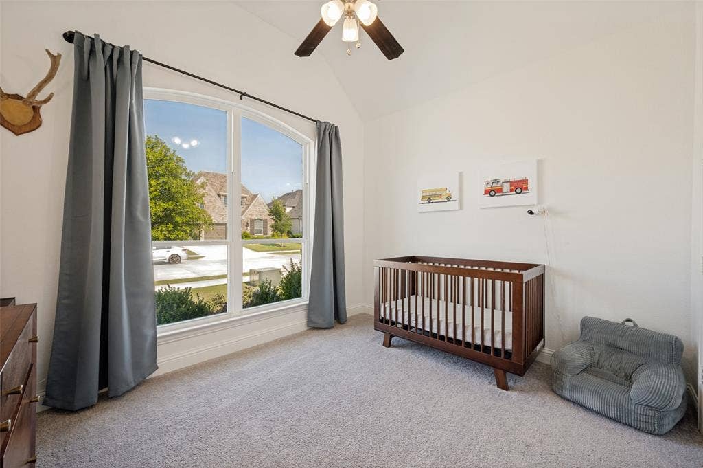 961 Gladewater Drive, Prosper, TX 75078 Main floor bedroom has large windows and heightened ceilings to open up this spacious room