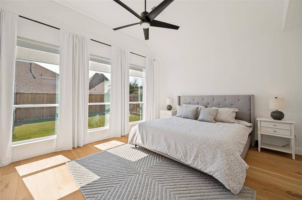 961 Gladewater Drive, Prosper, TX 75078 These windows stream natural light with heightened ceilings opening up this spacious primary bedroom