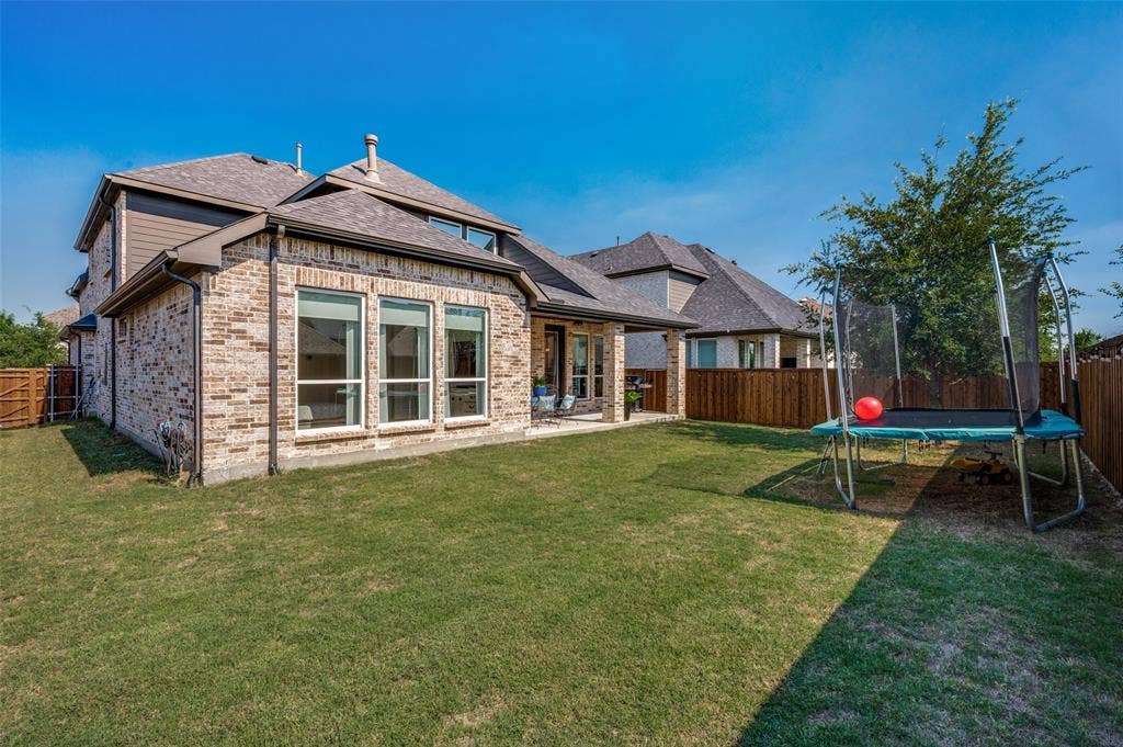 961 Gladewater Drive, Prosper, TX 75078 Enclosed backyard providing privacy and safety for pets and play