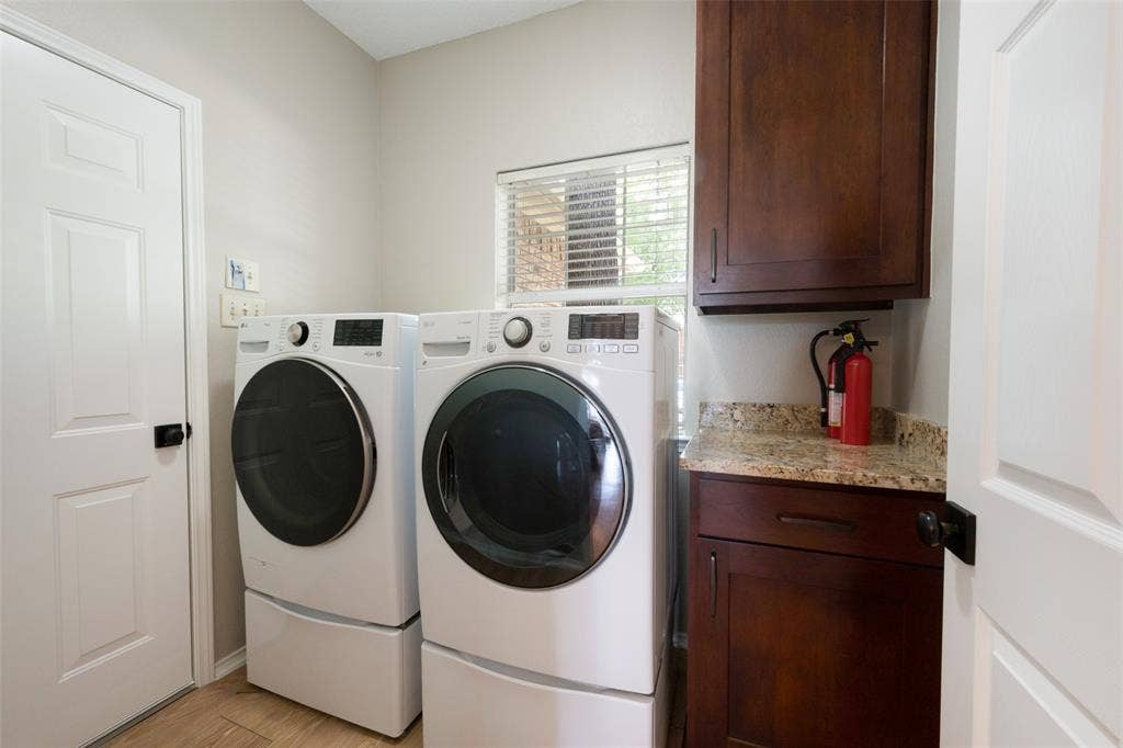 1818 Haydenbend Circle, Grapevine, TX 76051 Laundry room with built in cabinets
