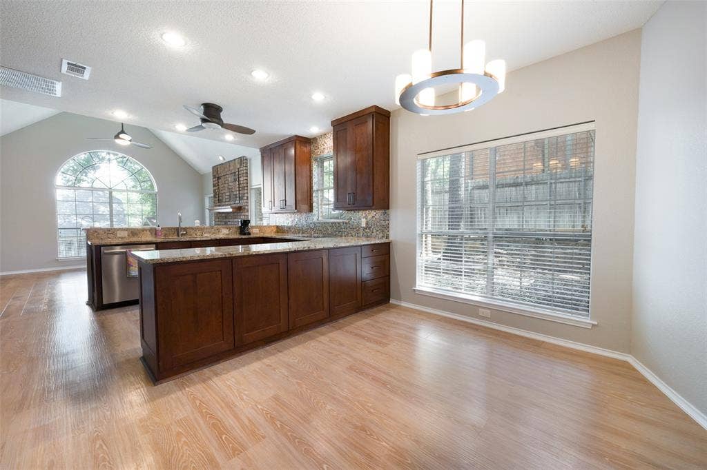 1818 Haydenbend Circle, Grapevine, TX 76051 Eat in kitchen with wood like florr