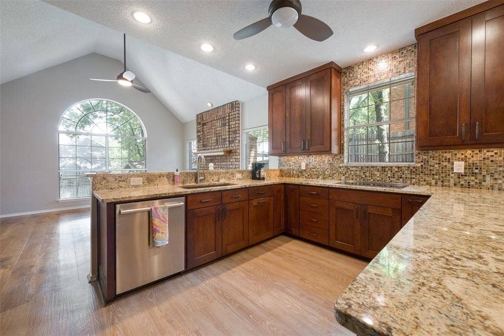 1818 Haydenbend Circle, Grapevine, TX 76051 Large kitchen with beautiful cabinets, wood like floor and window