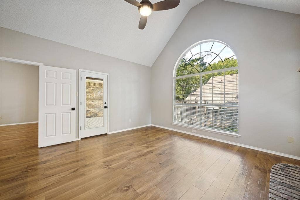 1818 Haydenbend Circle, Grapevine, TX 76051 Living room with wood like floor and large window