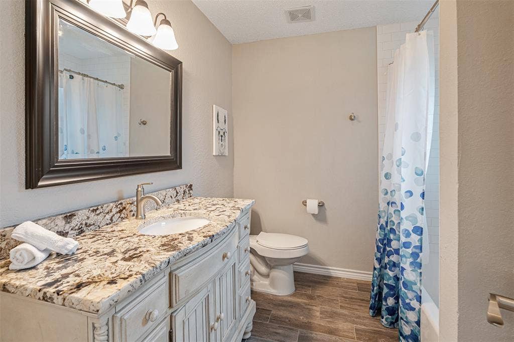 1102 Mill Run Road, Athens, TX 75751 Primary bath with new tub/shower and countertops.