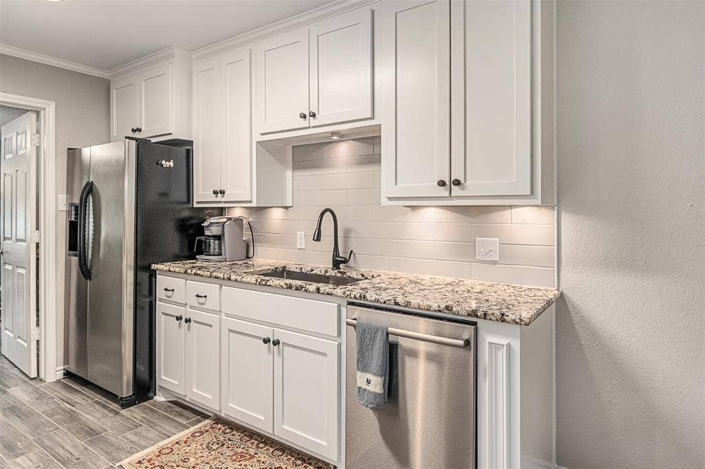 1102 Mill Run Road, Athens, TX 75751 kitchen leading into formal dining.