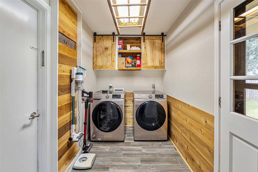 1102 Mill Run Road, Athens, TX 75751 Large laundry with entrance to garage and backyard.