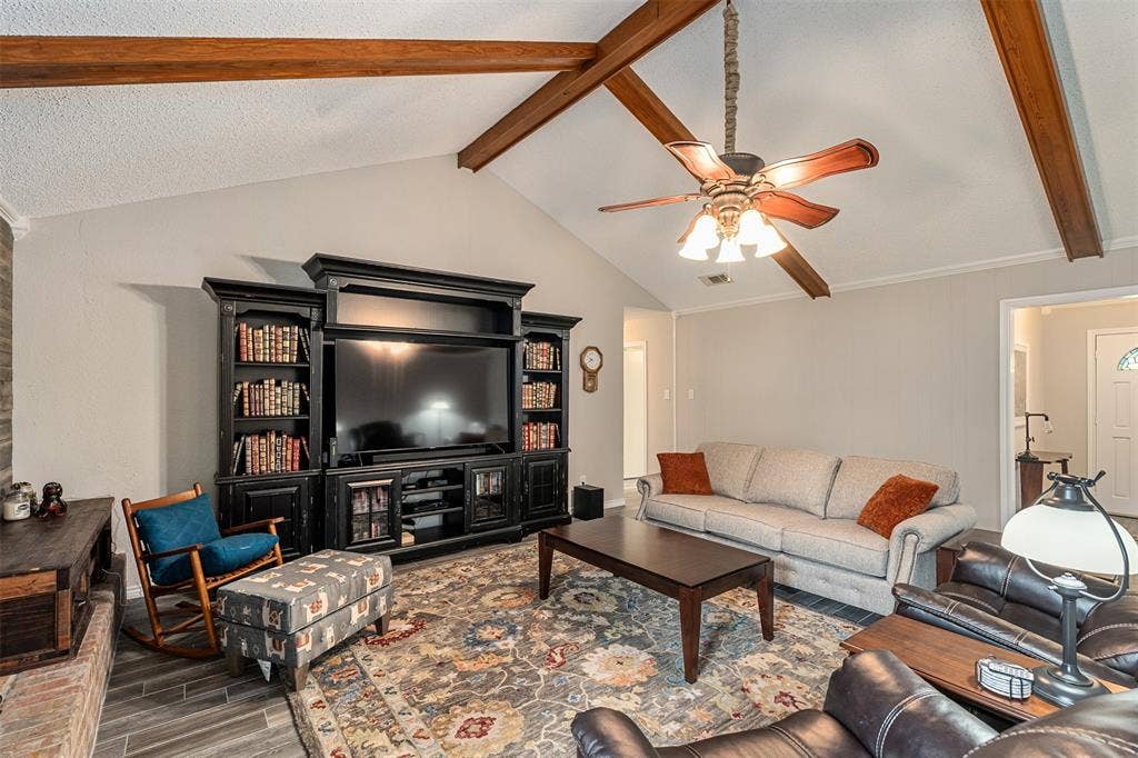 1102 Mill Run Road, Athens, TX 75751 Living with brick fireplace, vaulted ceilings and beautiful wood beams