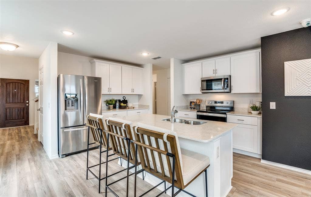 816 Springwell Drive, Princeton, TX 75407 *Model Representation - Spacious kitchen with eat-in bartop island