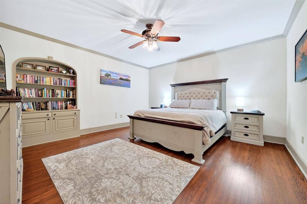 1901 Rose Point, Athens, TX 75752 Hardwood-finish flooring, built-in shelving, crown molding, ceiling fan, and ample wall space