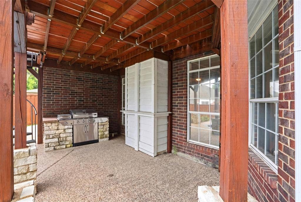 8812 Smokey Drive, Plano, TX 75025 Ground floor covered patio with built-in grill