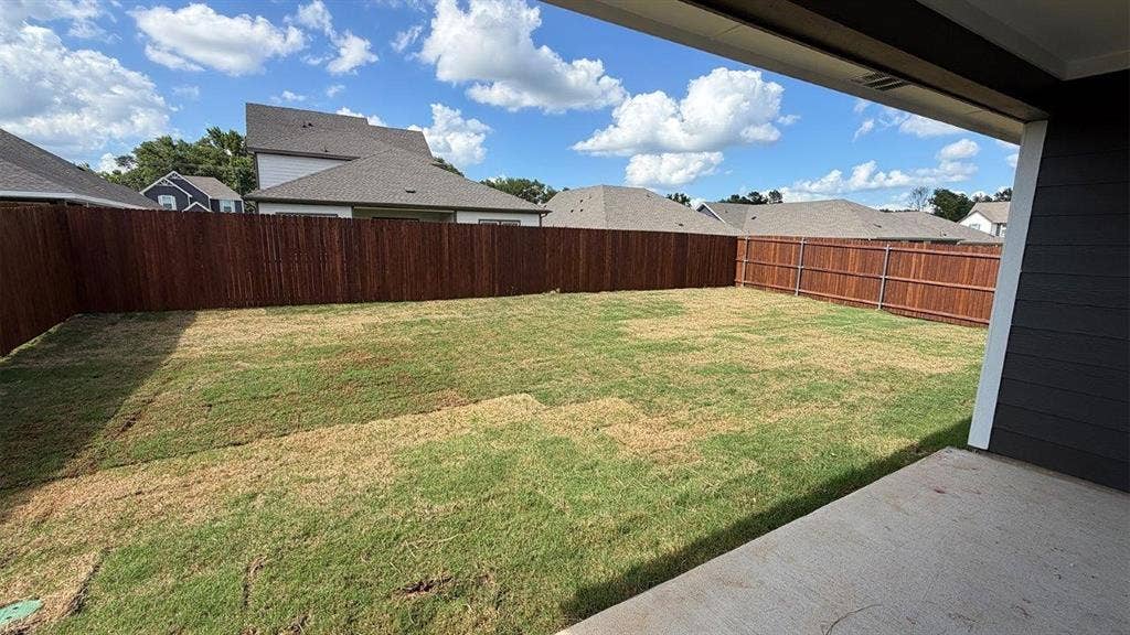 3013 Hidden Valley Drive, Lindale, TX 75771 Expansive backyard featuring a new sod lawn and full privacy fencing