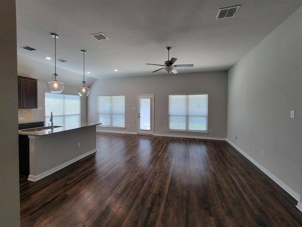 1106 Placid Circle, Waco, TX 76706 Open-concept living space featuring wood-finish flooring, recessed lighting, and a ceiling fan