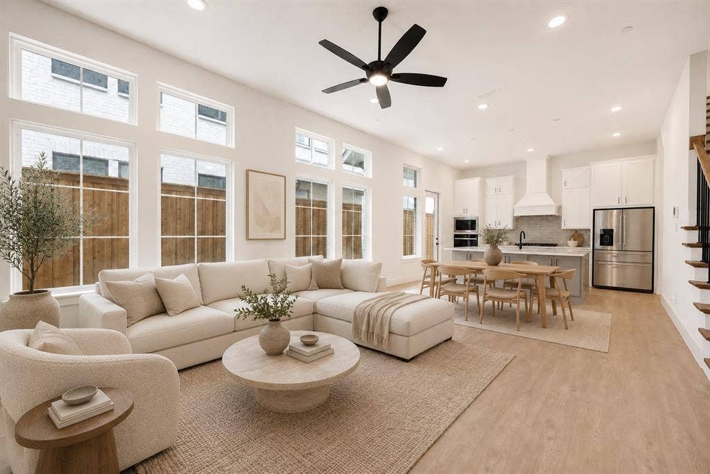 11965 Brubaker Drive, Frisco, TX 75033 Open-concept living space featuring high ceilings, recessed lighting, and light wood-finish flooring
