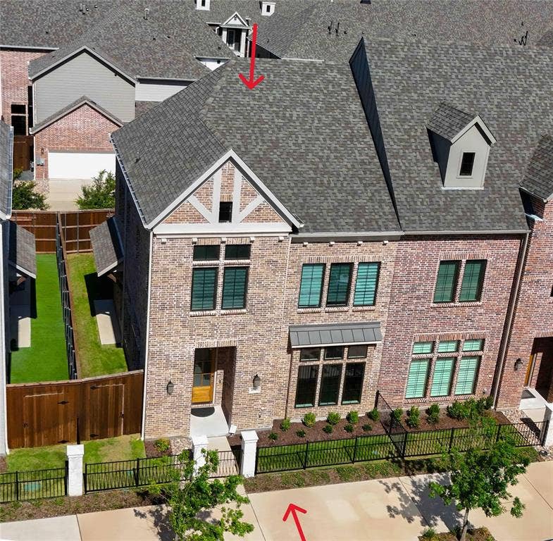 11965 Brubaker Drive, Frisco, TX 75033 Brick exterior featuring a gabled roofline and dormer window