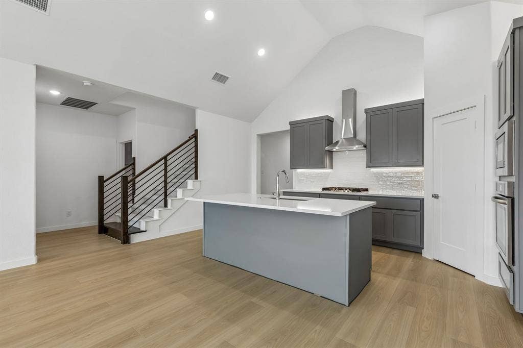 1429 Companero Street, Haslet, TX 76052 Kitchen in the Claret home plan by Trophy Signature Homes – REPRESENTATIVE PHOTO