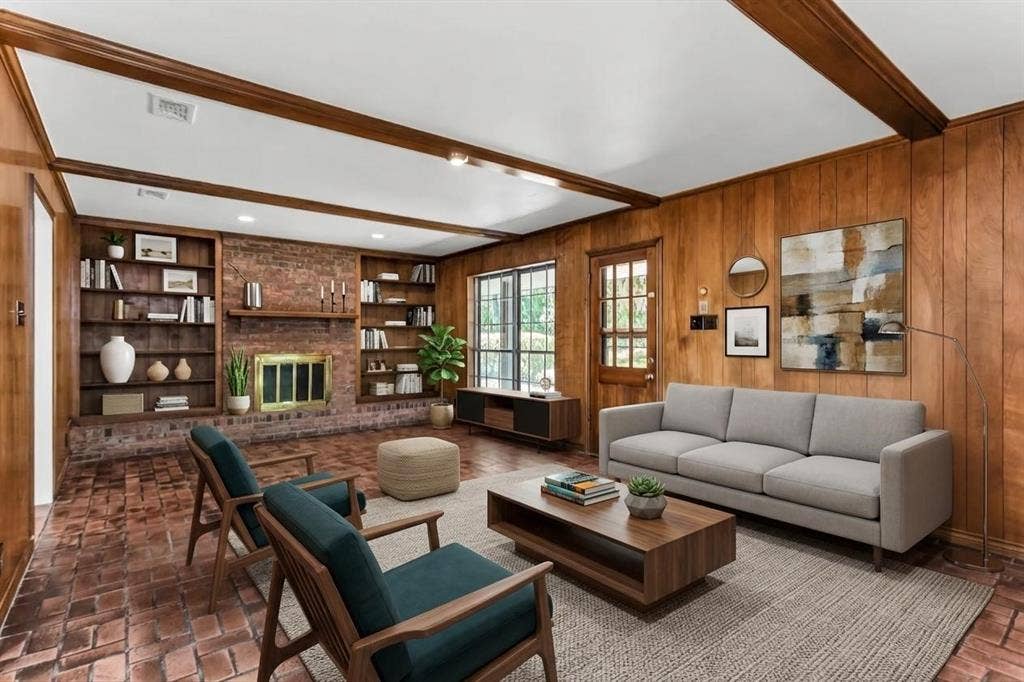 101 Hollyhill Lane, Denton, TX 76205 Living area featuring wood-paneled walls and exposed ceiling beams