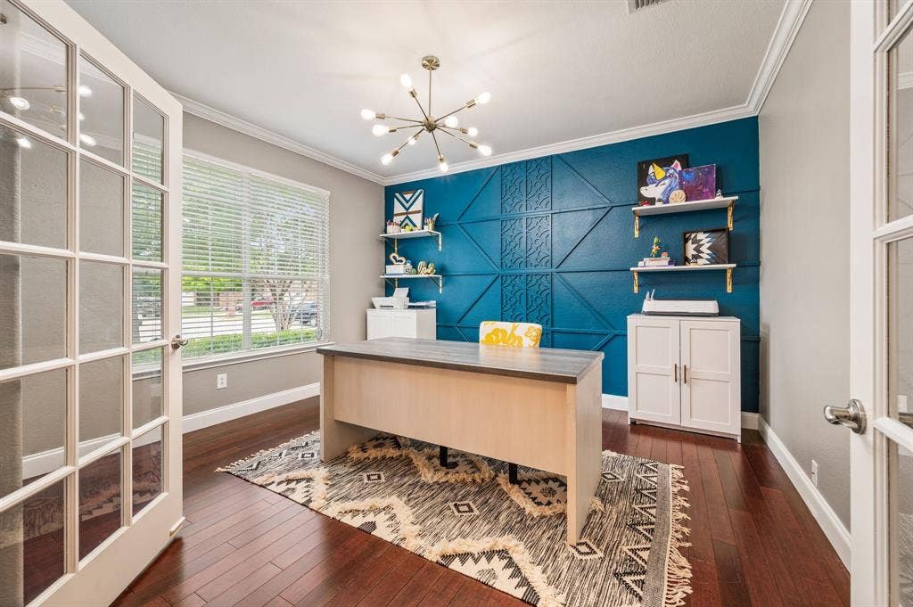 308 Bradbury Drive, Euless, TX 76040 Private home office with stunning custom accent wall, French doors & abundant natural light.