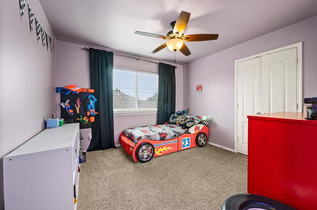 308 Bradbury Drive, Euless, TX 76040 Bright secondary bedroom with plush carpet & great natural light.