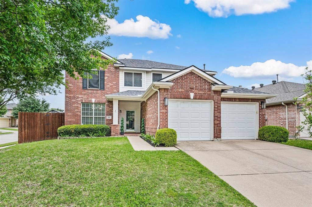 308 Bradbury Drive, Euless, TX 76040 Timeless brick exterior paired with lush landscaping & fresh modern touches throughout.